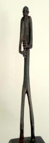 Lucas SITHOLE LS6107 "Penny whistler II. " 1961 – Sculpture in wood on wooden base - 48cm H